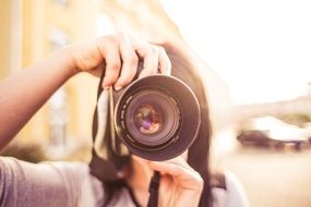 female photograph taking picture