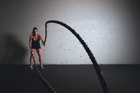 girl is training with ropes