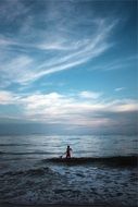 man on the beach near the ocean