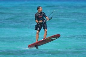 man surfing the waves