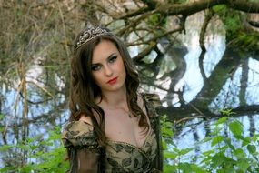 girl in princess style on a background of nature