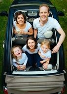 family in car