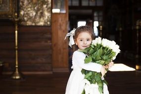 young girl with flowers bouquet