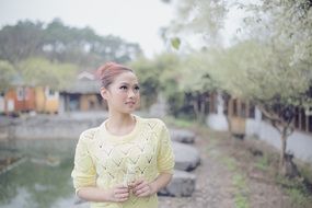 young woman in a spring park