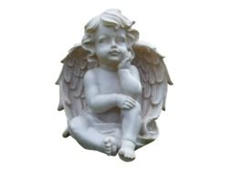 white color statue of angel cherub symbol of religion