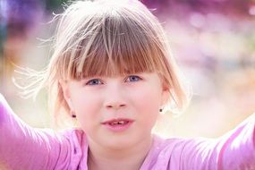 portrait of child girl face blond hair