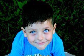 portrait of a boy with bright blue eyes