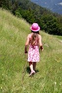 child girl walking meadow