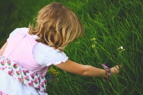 incredibly beautiful little girl with flower