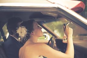 newlyweds in the car