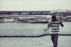 Photo of the man who is playing on a trumpet