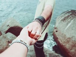 couple in love hold hands
