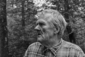 photo portrait of a homeless man, black and white