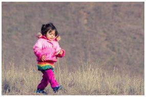 walking chinesse girl in pink coat