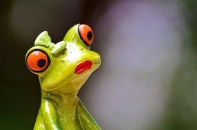 funny figurine of a frog with red lips