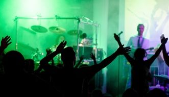 crowd cheering music band in the nightclub