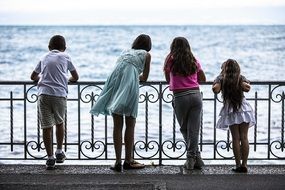 curious children on the embankment