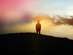 silhouette of a man at sunset