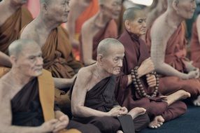 Old monks are praying