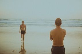 Two men on a beach