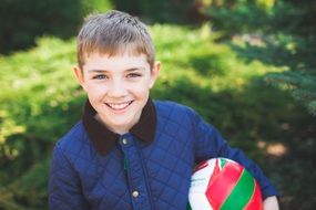 smiling boy with ball