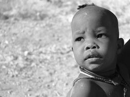 black and white portrait of an african child