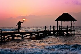 photo of the man is holding a sun