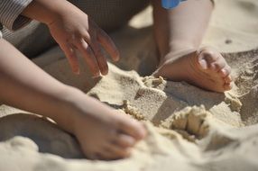 foot child at the beach