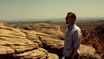 a man standing in the desert