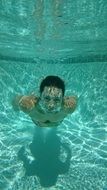 underwater swimming girl