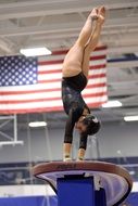 Gymnast shows exercise for balance