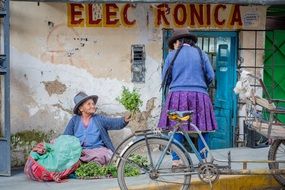 Peruvian people near the building