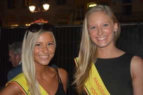 two blonde smiling miss beauty