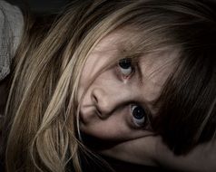portrait of a girl with big blue eyes