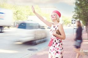 beautiful woman stops the car