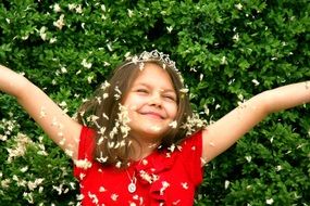 happy girl in white petals