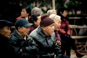 old asian people sitting