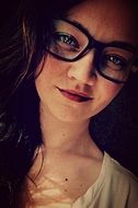 portrait of incredibly beautiful girl with glasses