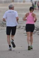 man and woman jogging