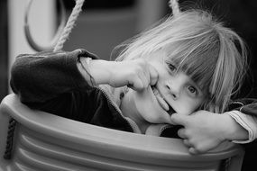 child girl blond face swing black and white recording