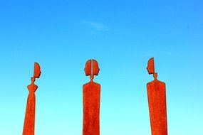 orange faces at sky, modern art