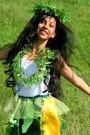 young girl with long ,black hair is dancing