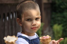 portrait of a little boy with ice cream