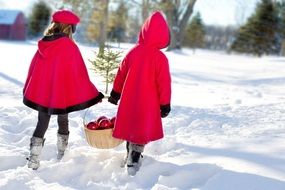 christmas girls in red coats