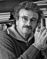 black and white portrait of a smart man with glasses