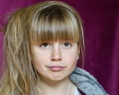portrait of a girl on a pink background
