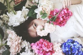 portrait of a girl and a bouquet of flowers