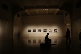 silhouettes of people on stage