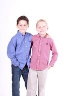 hugging boys stand on a white background