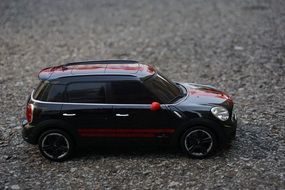 black model car on asphalt